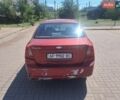 Красный Шевроле Лачетти, объемом двигателя 1.6 л и пробегом 465 тыс. км за 1800 $, фото 1 на Automoto.ua