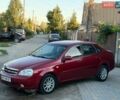 Красный Шевроле Лачетти, объемом двигателя 1.8 л и пробегом 320 тыс. км за 2850 $, фото 1 на Automoto.ua