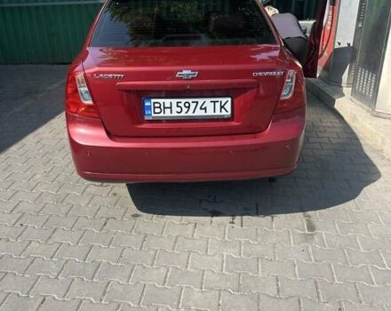 Красный Шевроле Лачетти, объемом двигателя 1.6 л и пробегом 370 тыс. км за 5000 $, фото 3 на Automoto.ua
