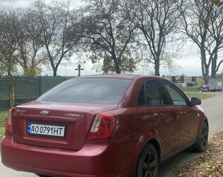 Красный Шевроле Лачетти, объемом двигателя 1.8 л и пробегом 250 тыс. км за 1850 $, фото 2 на Automoto.ua