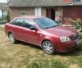 Красный Шевроле Лачетти, объемом двигателя 1.6 л и пробегом 235 тыс. км за 3850 $, фото 1 на Automoto.ua