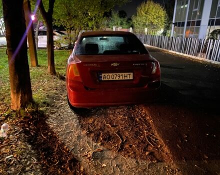 Красный Шевроле Лачетти, объемом двигателя 1.8 л и пробегом 240 тыс. км за 2000 $, фото 1 на Automoto.ua