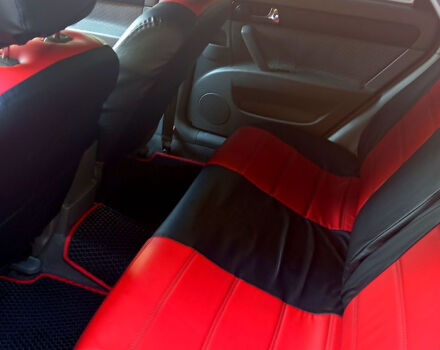 Красный Шевроле Лачетти, объемом двигателя 1.8 л и пробегом 180 тыс. км за 4550 $, фото 4 на Automoto.ua