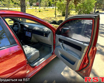 Красный Шевроле Лачетти, объемом двигателя 1.8 л и пробегом 185 тыс. км за 3900 $, фото 8 на Automoto.ua