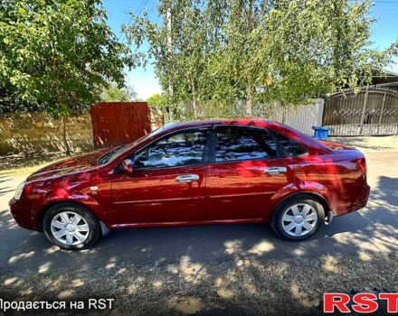 Красный Шевроле Лачетти, объемом двигателя 1.8 л и пробегом 185 тыс. км за 3900 $, фото 1 на Automoto.ua