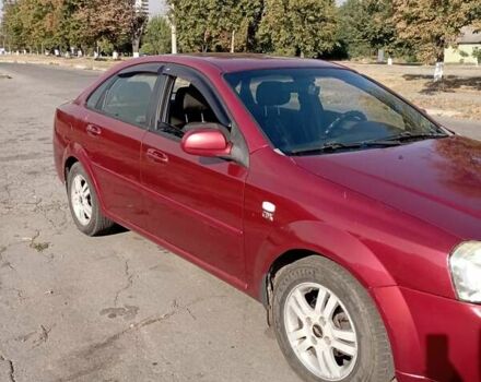 Красный Шевроле Лачетти, объемом двигателя 1.8 л и пробегом 283 тыс. км за 4400 $, фото 8 на Automoto.ua