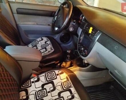 Красный Шевроле Лачетти, объемом двигателя 1.6 л и пробегом 235 тыс. км за 3850 $, фото 3 на Automoto.ua