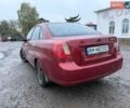 Красный Шевроле Лачетти, объемом двигателя 1.8 л и пробегом 349 тыс. км за 3500 $, фото 1 на Automoto.ua
