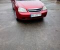 Красный Шевроле Лачетти, объемом двигателя 1.8 л и пробегом 240 тыс. км за 3600 $, фото 1 на Automoto.ua