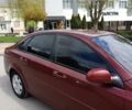Красный Шевроле Лачетти, объемом двигателя 1.8 л и пробегом 231 тыс. км за 3500 $, фото 1 на Automoto.ua