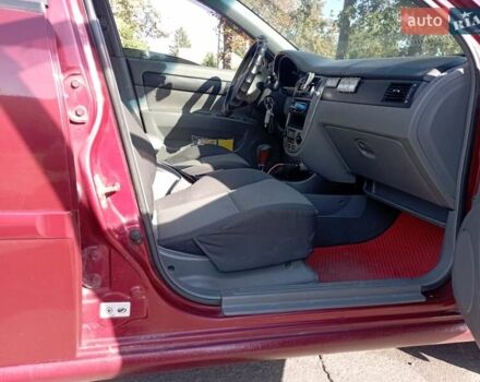 Красный Шевроле Лачетти, объемом двигателя 1.8 л и пробегом 283 тыс. км за 4400 $, фото 6 на Automoto.ua