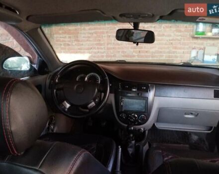 Красный Шевроле Лачетти, объемом двигателя 1.6 л и пробегом 235 тыс. км за 3850 $, фото 4 на Automoto.ua