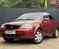 Червоний Шевроле Лачетті, об'ємом двигуна 1.8 л та пробігом 245 тис. км за 2650 $, фото 7 на Automoto.ua