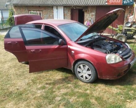 Красный Шевроле Лачетти, объемом двигателя 1.6 л и пробегом 235 тыс. км за 3850 $, фото 2 на Automoto.ua