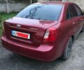 Красный Шевроле Лачетти, объемом двигателя 1.8 л и пробегом 250 тыс. км за 800 $, фото 1 на Automoto.ua