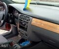 Червоний Шевроле Лачетті, об'ємом двигуна 1.8 л та пробігом 228 тис. км за 4400 $, фото 10 на Automoto.ua