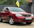 Червоний Шевроле Лачетті, об'ємом двигуна 1.8 л та пробігом 245 тис. км за 2650 $, фото 1 на Automoto.ua