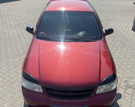 Красный Шевроле Лачетти, объемом двигателя 1.6 л и пробегом 370 тыс. км за 5000 $, фото 5 на Automoto.ua