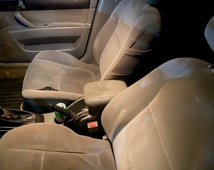 Красный Шевроле Лачетти, объемом двигателя 1.8 л и пробегом 240 тыс. км за 2000 $, фото 3 на Automoto.ua