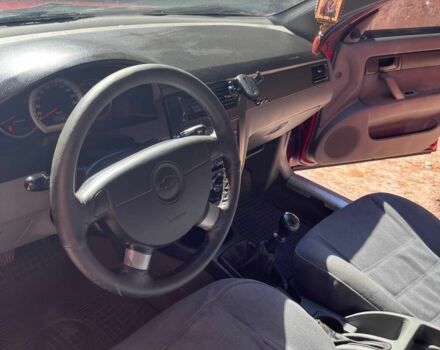 Червоний Шевроле Лачетті, об'ємом двигуна 1.6 л та пробігом 256 тис. км за 4522 $, фото 4 на Automoto.ua