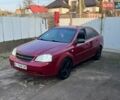 Красный Шевроле Лачетти, объемом двигателя 1.6 л и пробегом 222 тыс. км за 2800 $, фото 1 на Automoto.ua