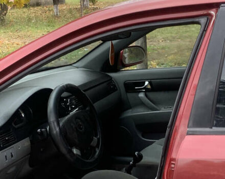 Красный Шевроле Лачетти, объемом двигателя 1.8 л и пробегом 250 тыс. км за 1850 $, фото 4 на Automoto.ua