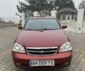 Червоний Шевроле Лачетті, об'ємом двигуна 1.8 л та пробігом 267 тис. км за 3900 $, фото 1 на Automoto.ua