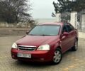 Червоний Шевроле Лачетті, об'ємом двигуна 1.8 л та пробігом 267 тис. км за 3900 $, фото 1 на Automoto.ua