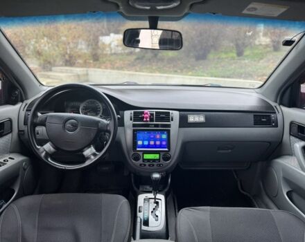 Червоний Шевроле Лачетті, об'ємом двигуна 1.8 л та пробігом 267 тис. км за 3900 $, фото 6 на Automoto.ua