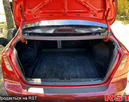 Красный Шевроле Лачетти, объемом двигателя 1.8 л и пробегом 185 тыс. км за 3900 $, фото 10 на Automoto.ua