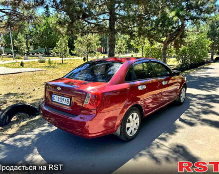 Красный Шевроле Лачетти, объемом двигателя 1.8 л и пробегом 185 тыс. км за 3900 $, фото 4 на Automoto.ua