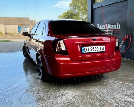 Красный Шевроле Лачетти, объемом двигателя 1.8 л и пробегом 211 тыс. км за 5200 $, фото 2 на Automoto.ua