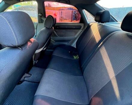 Червоний Шевроле Лачетті, об'ємом двигуна 1.6 л та пробігом 267 тис. км за 4300 $, фото 12 на Automoto.ua