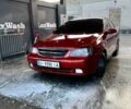 Красный Шевроле Лачетти, объемом двигателя 1.8 л и пробегом 211 тыс. км за 5200 $, фото 1 на Automoto.ua