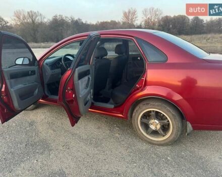 Красный Шевроле Лачетти, объемом двигателя 1.8 л и пробегом 189 тыс. км за 4200 $, фото 11 на Automoto.ua