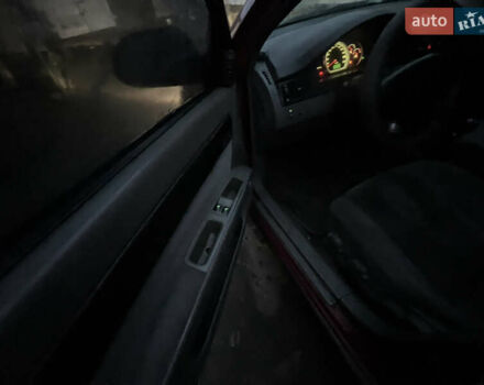 Красный Шевроле Лачетти, объемом двигателя 1.8 л и пробегом 305 тыс. км за 1850 $, фото 9 на Automoto.ua