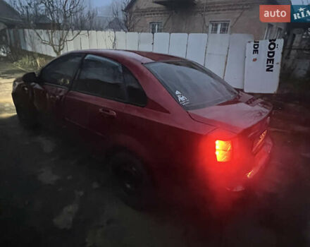 Красный Шевроле Лачетти, объемом двигателя 1.8 л и пробегом 305 тыс. км за 1850 $, фото 3 на Automoto.ua