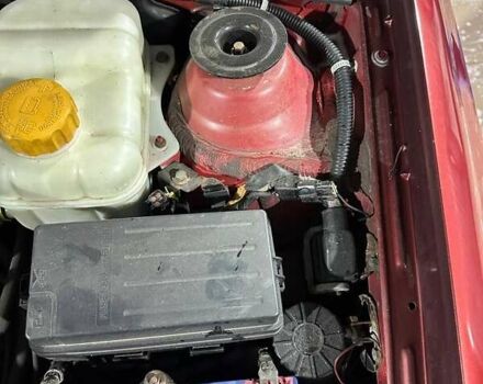 Червоний Шевроле Лачетті, об'ємом двигуна 1.8 л та пробігом 342 тис. км за 2400 $, фото 10 на Automoto.ua