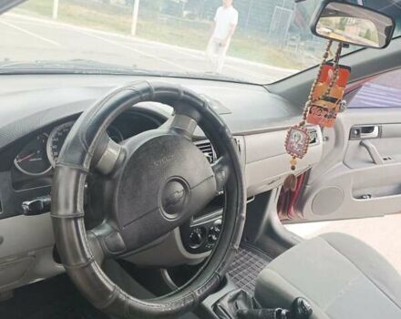 Червоний Шевроле Лачетті, об'ємом двигуна 1.6 л та пробігом 265 тис. км за 3000 $, фото 4 на Automoto.ua