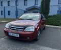 Красный Шевроле Лачетти, объемом двигателя 1.6 л и пробегом 370 тыс. км за 2000 $, фото 1 на Automoto.ua