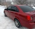 Красный Шевроле Лачетти, объемом двигателя 1.6 л и пробегом 190 тыс. км за 3500 $, фото 1 на Automoto.ua