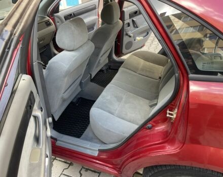 Красный Шевроле Лачетти, объемом двигателя 1.4 л и пробегом 241 тыс. км за 4200 $, фото 2 на Automoto.ua