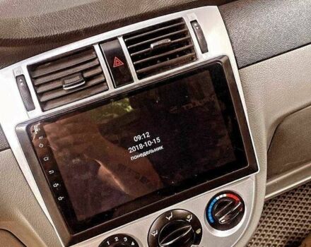 Красный Шевроле Лачетти, объемом двигателя 1.8 л и пробегом 211 тыс. км за 5200 $, фото 7 на Automoto.ua