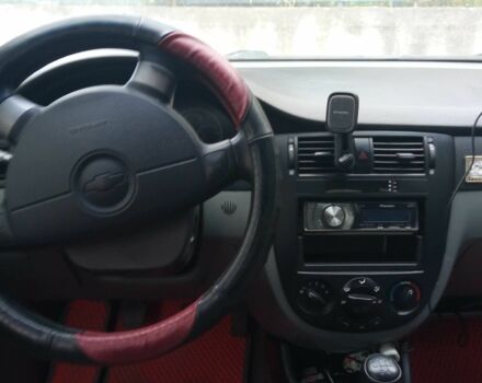 Красный Шевроле Лачетти, объемом двигателя 1.6 л и пробегом 143 тыс. км за 3800 $, фото 2 на Automoto.ua