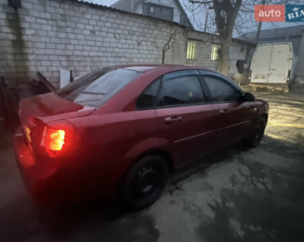 Красный Шевроле Лачетти, объемом двигателя 1.8 л и пробегом 305 тыс. км за 1850 $, фото 2 на Automoto.ua