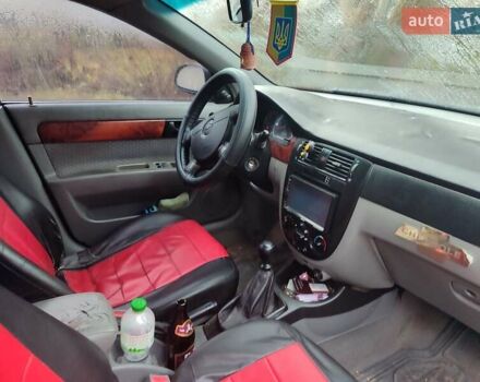 Красный Шевроле Лачетти, объемом двигателя 1.6 л и пробегом 296 тыс. км за 2900 $, фото 5 на Automoto.ua