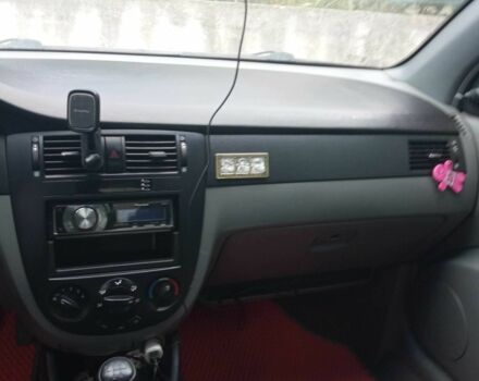 Красный Шевроле Лачетти, объемом двигателя 1.6 л и пробегом 143 тыс. км за 3800 $, фото 1 на Automoto.ua