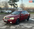 Красный Шевроле Лачетти, объемом двигателя 1.8 л и пробегом 305 тыс. км за 1850 $, фото 7 на Automoto.ua
