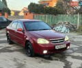 Красный Шевроле Лачетти, объемом двигателя 1.8 л и пробегом 305 тыс. км за 1850 $, фото 1 на Automoto.ua