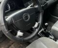 Червоний Шевроле Лачетті, об'ємом двигуна 1.8 л та пробігом 261 тис. км за 5000 $, фото 1 на Automoto.ua